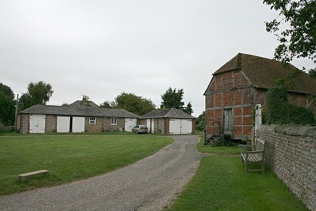 Manor Farm outbuildings, Eastergate. Outbuildings at Eastergate Manor Farm, including the 138683 (right) on staddle stones.