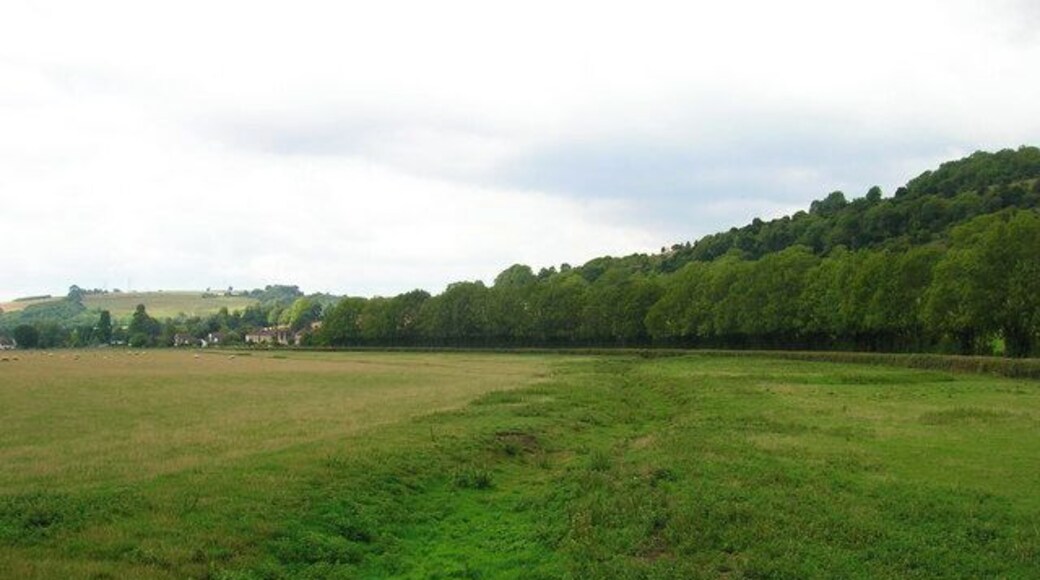 River Lavant, Charlton. Looking at the dried up bed of the river as it heads towards Singleton which can be seen in the background.