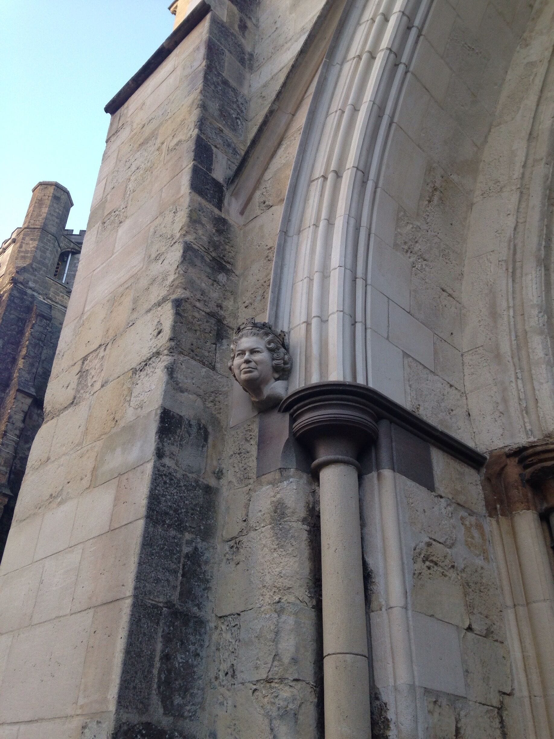 Great bust of the queens head on the entrance to cathedral.