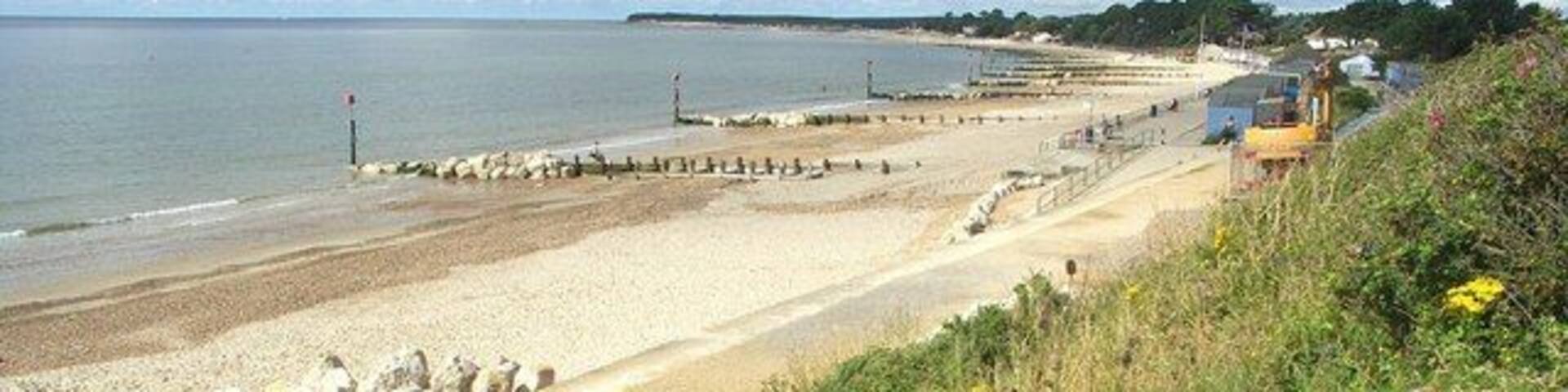 Friars Cliff Beach from Steamer Point This view is looking west from the cliff top at Steamer Point. It gets its name from the old paddle steamer that was beached here in about 1830, and used as a site office for the construction of Highcliffe Castle. Afterwards, the boat became a beach house for about 60 years but fell into disuse and dereliction at the turn of the 20th century. It has now given its name to Steamer Point Nature Reserve, further up the cliffs to the east.