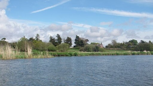 River Avon between Sopley and Winkton The gatehouse to moorlands Bible College is the building just right of centre, in this view from the river.