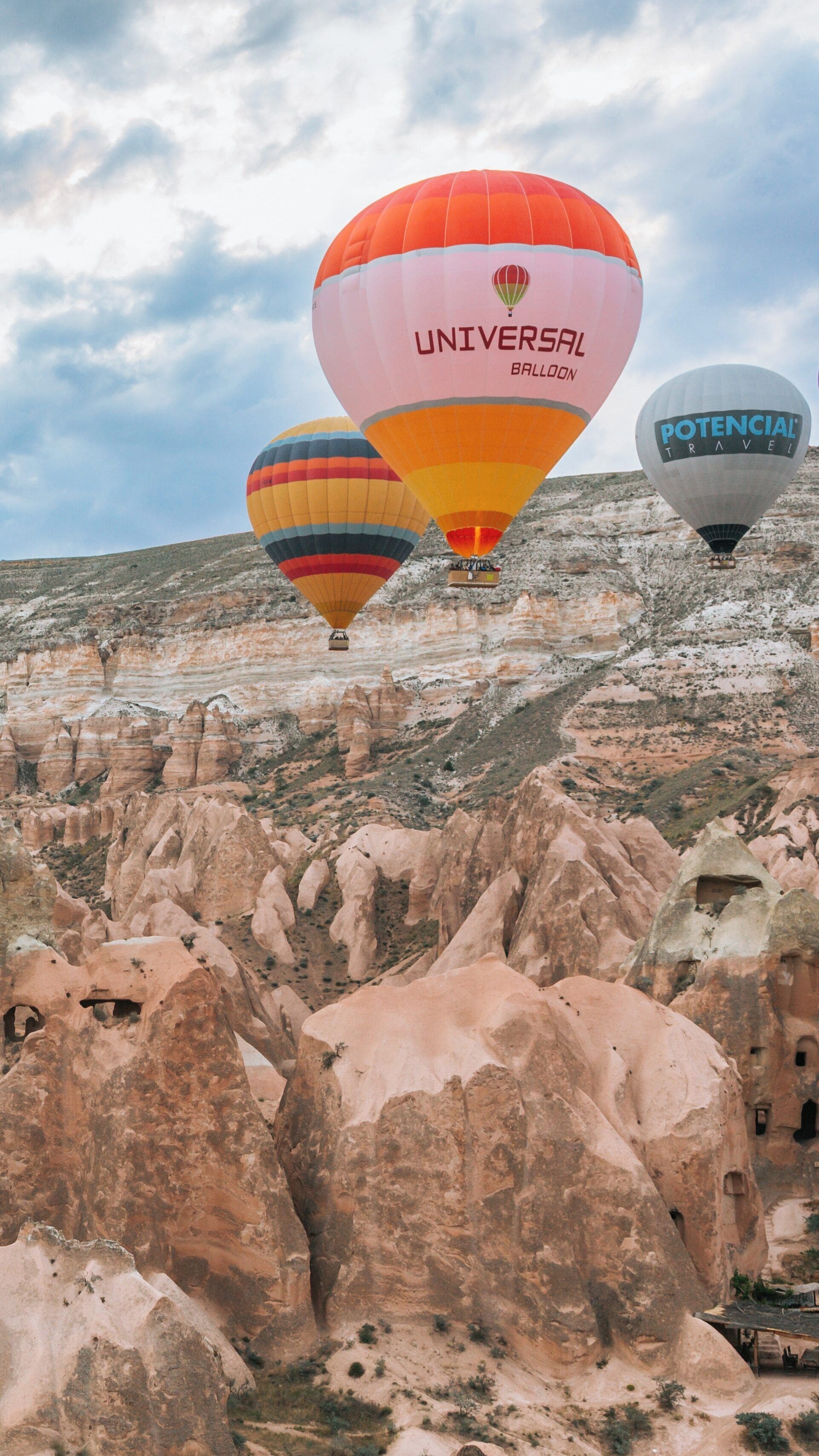 Experience breathtaking hot air balloon rides over the stunning landscapes of Rose Valley in Nevsehir, Turkey at sunrise