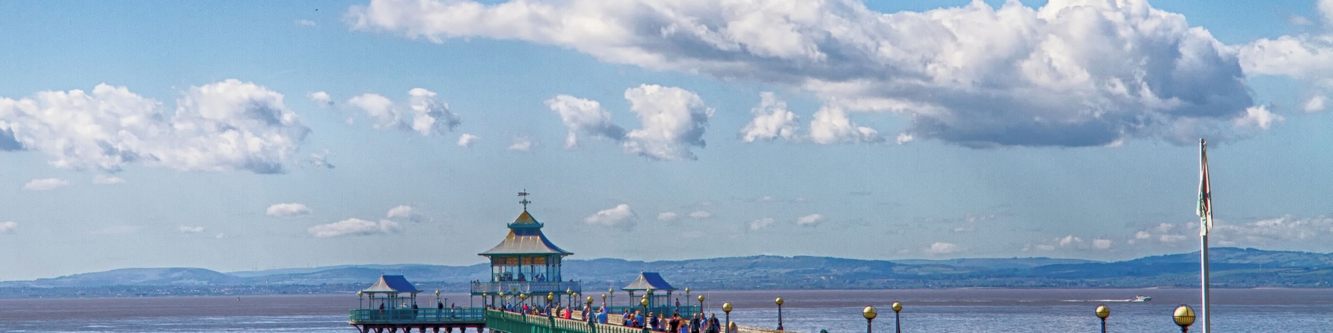 Clevedon Pier was opened in 1869 to receive paddle steamer passengers from Devon and Wales. It is a grade 2 listed building. Sir John Betjerman said it was "the most beautiful pier in England"