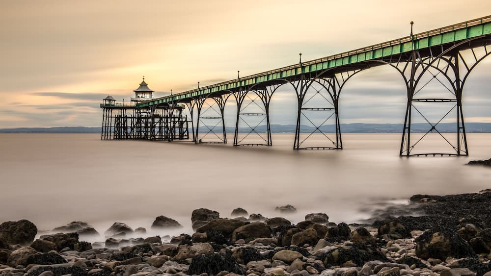 Beautiful shot of the Clevedon Pier in England under the breathtaking colorful sky