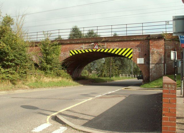 Railway bridge by Kelvedon railway station The road is Coggeshall Road.