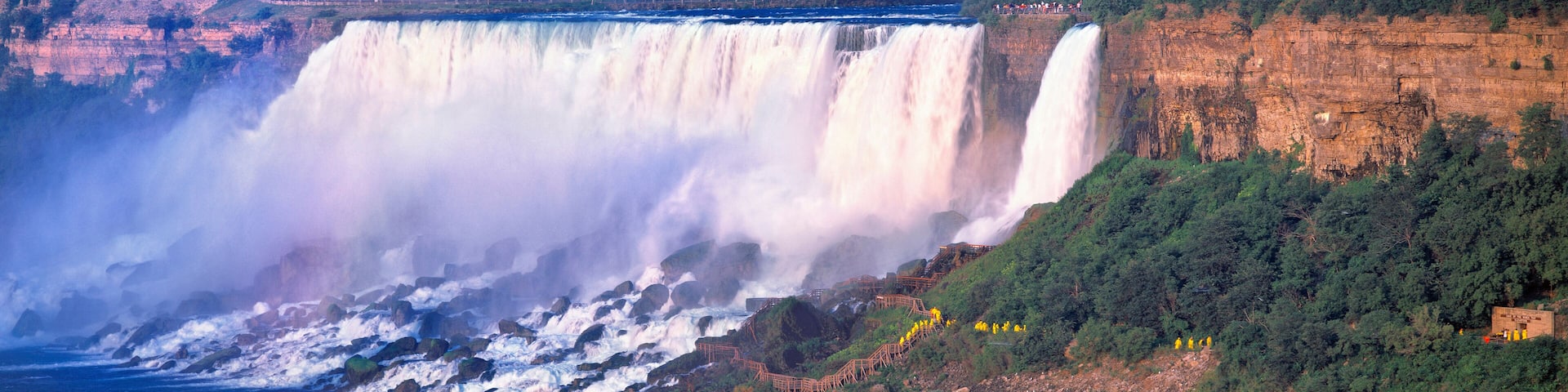 USA, New York, Niagara Falls. American & Bridal Veil Falls crash over the rocks in thundering glory, Niagara Falls, New York.