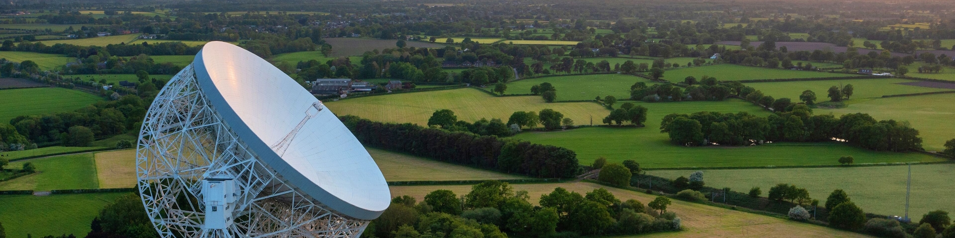Goostrey, Cheshire, United Kingdom. 05.22.2023 Sunset reflects against the Lovell Telescope, Cheshire. Aerial Image. 22nd May 2023.
