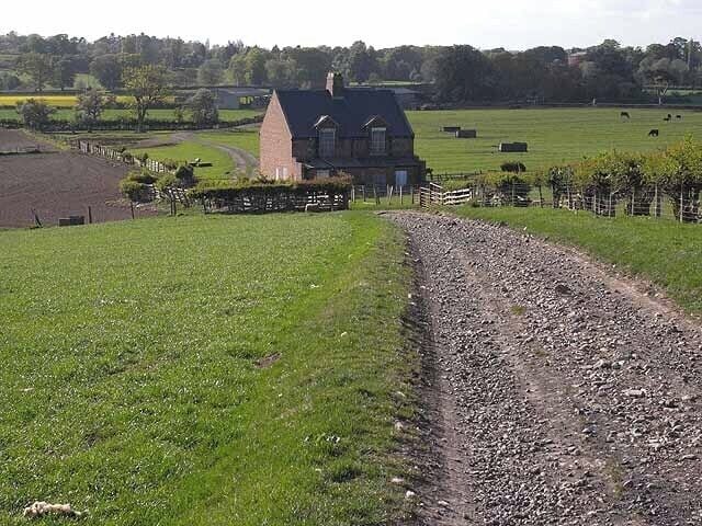 Bridleway to Low Hail Farm Low Hall Farm is situated on the inside of a huge meander on the River Tees. The farm cottage at the foot of the hill is unoccupied with windows boarded up.