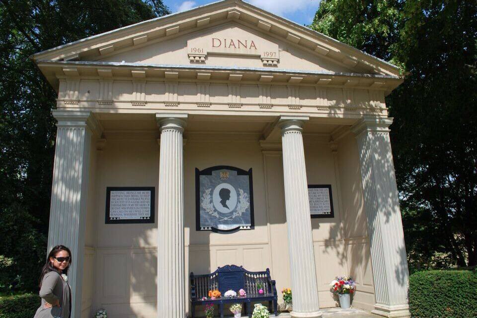 A neoclassical monument with the name 'DIANA' and dates '1961' and '1997'.