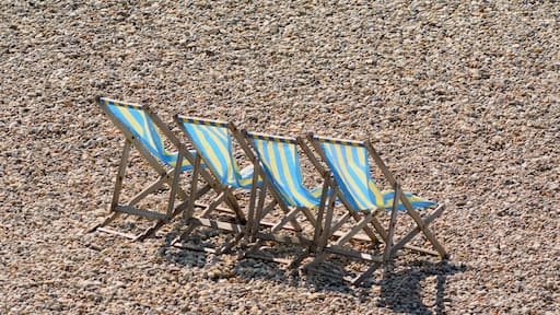 Beach chairs on the pebbles on the Jurassic Coast in Devon