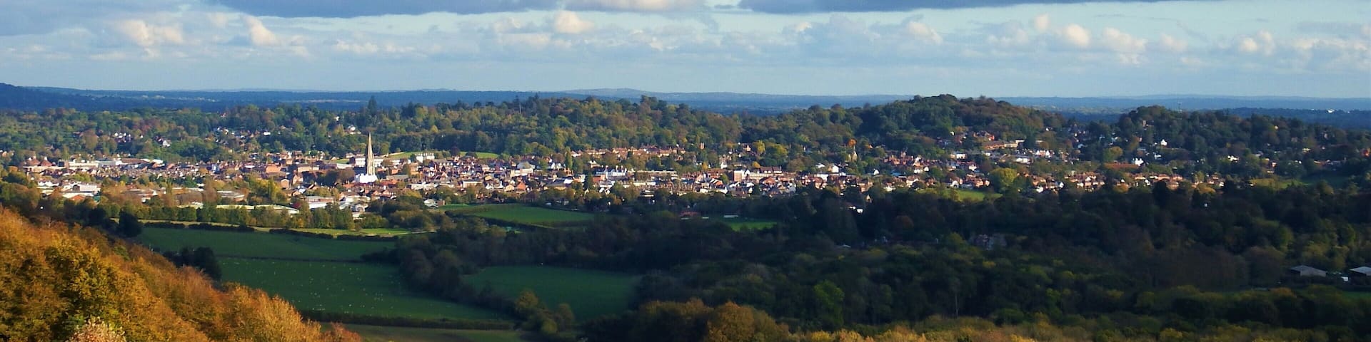 View over Dorking from Ranmore Common over farmland in dappled sunshine. Lovely high views from this escarpment which forms part of the Greensand Way. #perspective