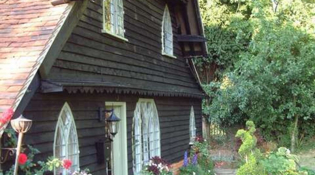 Barn Cottage. Cottage behind the pond in Ockley