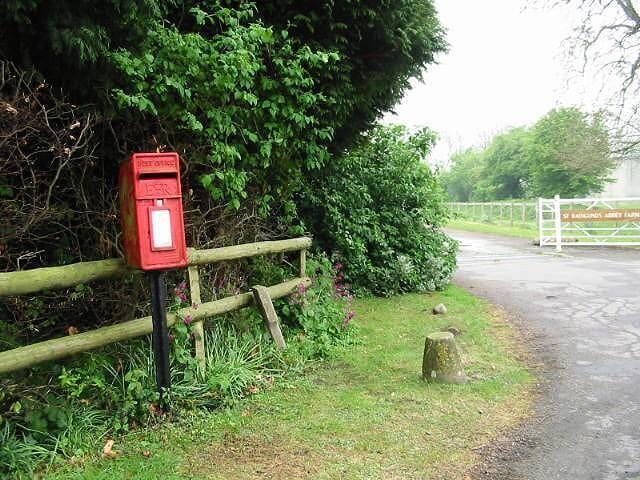 Post box and entrance to St Radigund's Abbey Farm