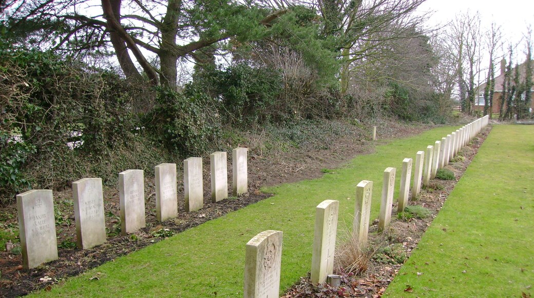 War Graves in Brandesburton Churchyard, Brandesburton, East Riding of Yorkshire, England. Not all the war graves are in this photo, the row on the left contains the graves of thirteen German airmen (all named) The righthand row are Allied airmen (not all named)