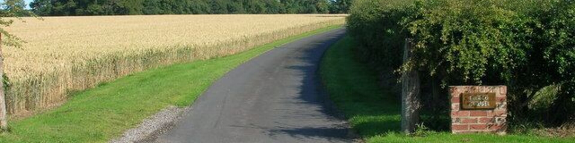 Track to Field House Farm, north west of Bainton, East Riding of Yorkshire, England. From the B1246.