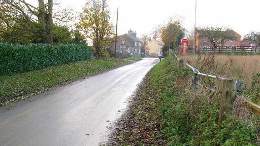 Tibthorpe, East Riding of Yorkshire. Looking west to Tibthorpe and the B1248 through the centre of the village