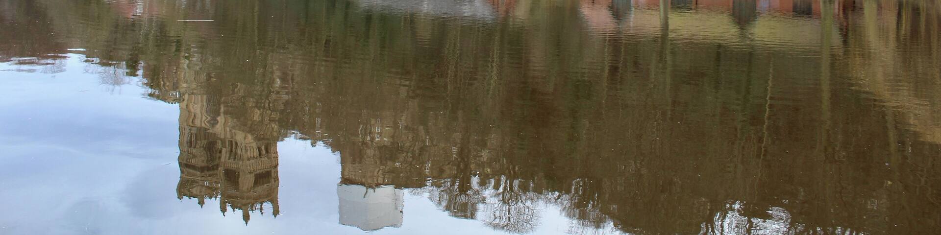Over the river looking at the boat house and cathedral