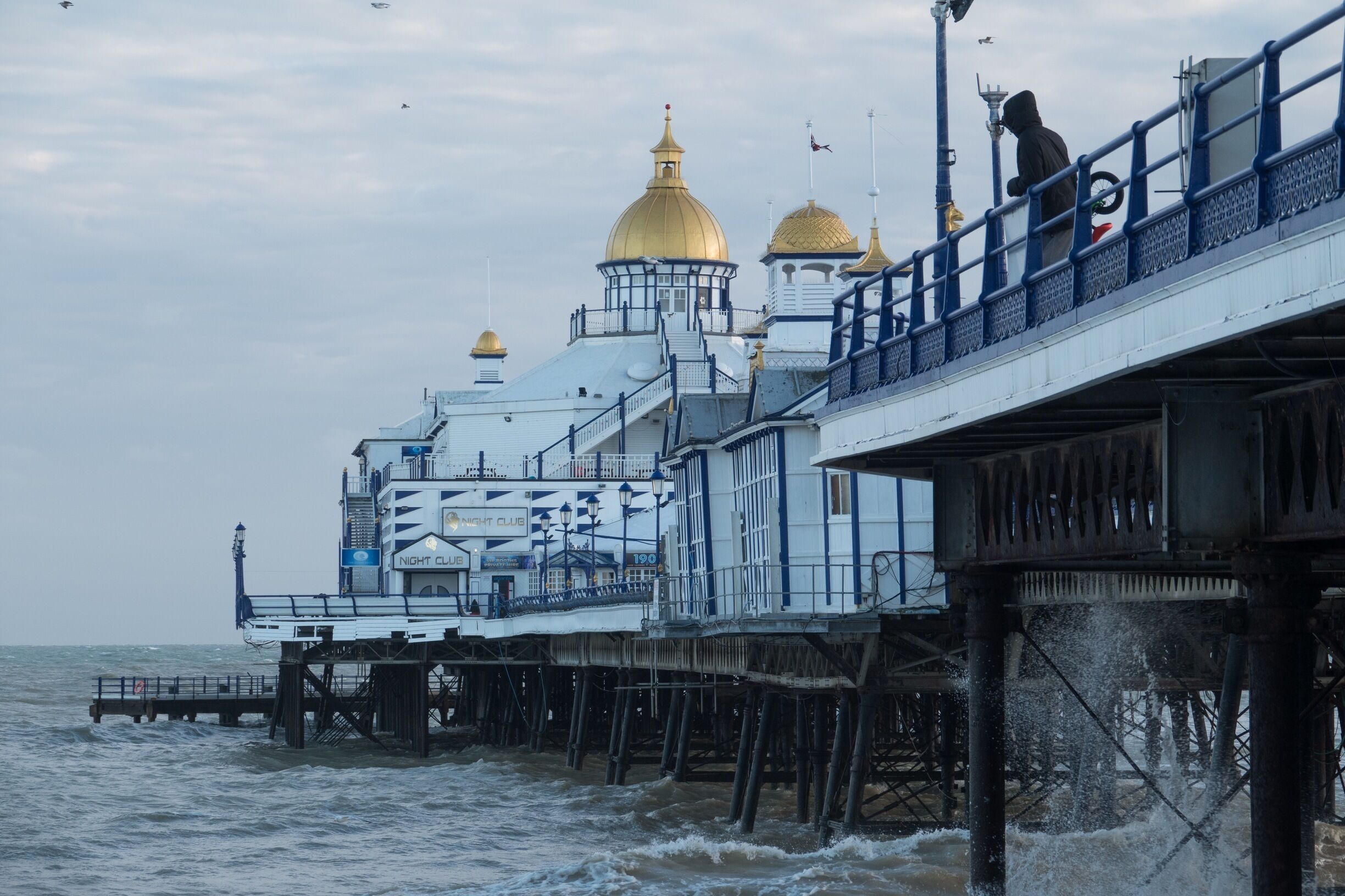 A view of the Victorian built Pier at the seaside town of Eastbourne in East Sussex. Its always good to take a stroll along come a freezing Winters day or a sweltering Summers one.