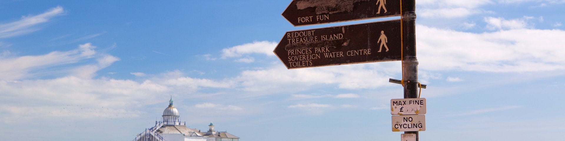 Eastbourne showing general coastal views and signage