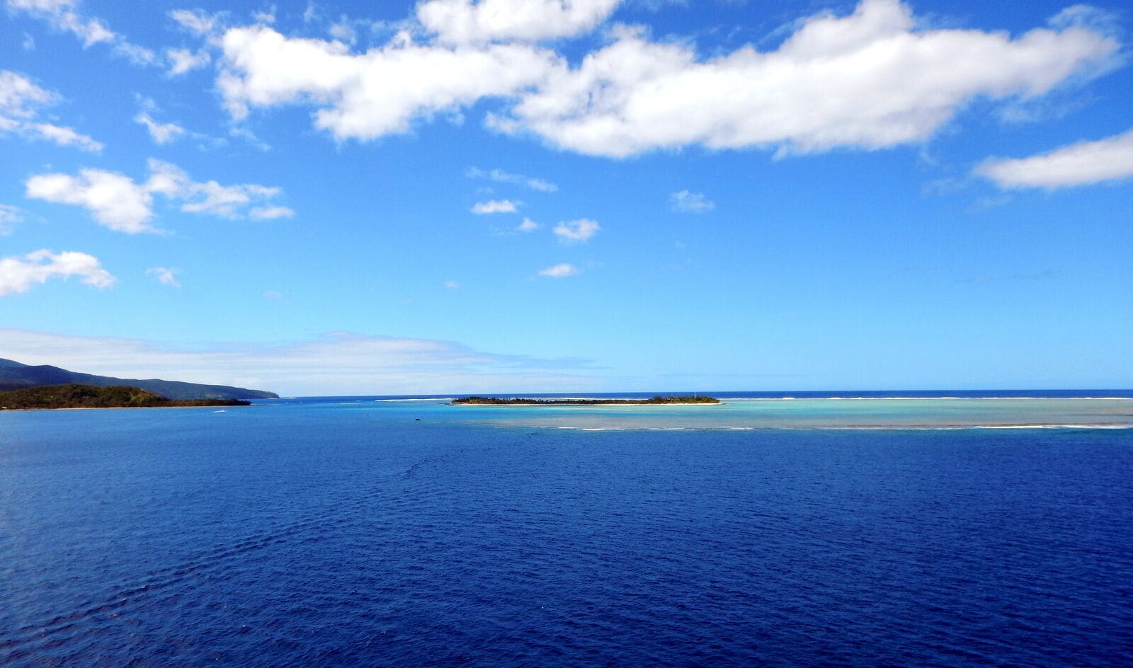 Irresistibly sublime – this is my take on Mystery Island. 
Population is ZERO. Why? 
This uninhabited tiny Islet in the Tafea Province of Vanuatu is considered taboo to live here. With only a few huts for overnight stays catering for tourists and pretty good amenities the only other thing this Island has is an Airstrip. 
