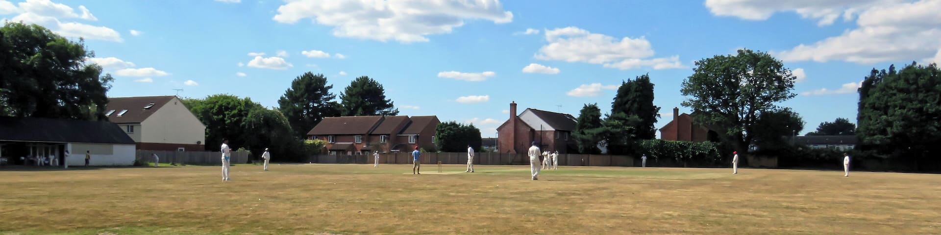 A public Sunday friendly match between Coopersale CC and Old Sectonians CC (Coopersale batting), at Coopersale, a village north from Epping, Essex, England. Coopersale Cricket Club, although previously running Saturday teams, today play only Sundays friendlies. Old Sectonians Cricket Club is a long-standing peripatetic club from Ilford, London. Camera: Canon PowerShot SX60 HS Software: File lens-corrected, optimized, perhaps cropped, with DxO PhotoLab, and likely further optimized with Adobe Photoshop CS2.