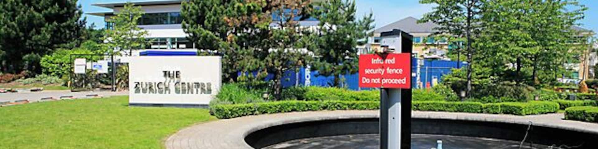 The Zurich Centre, Parkway in the Solent Business Park The Solent Business Park is quite intimidating, with lots of notices saying private, don't do this, and don't do that. Here we have an infrared beam around Zurich Life Assurance's offices. The road is however a public highway.