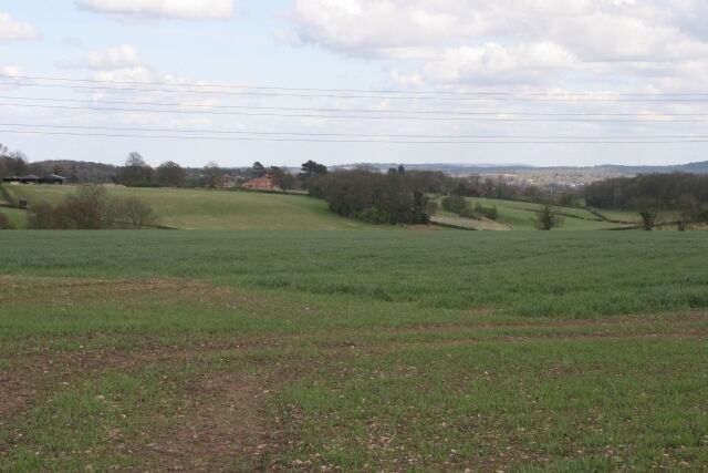 Wimble Hill. Looking east across the square from near the road junction on the western boundary.