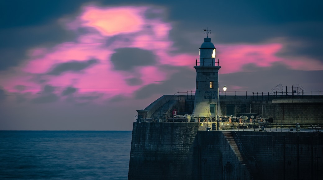 Photo taken from the beach opposite the harbour arm. Very little editing. Beautiful sunrise and location.