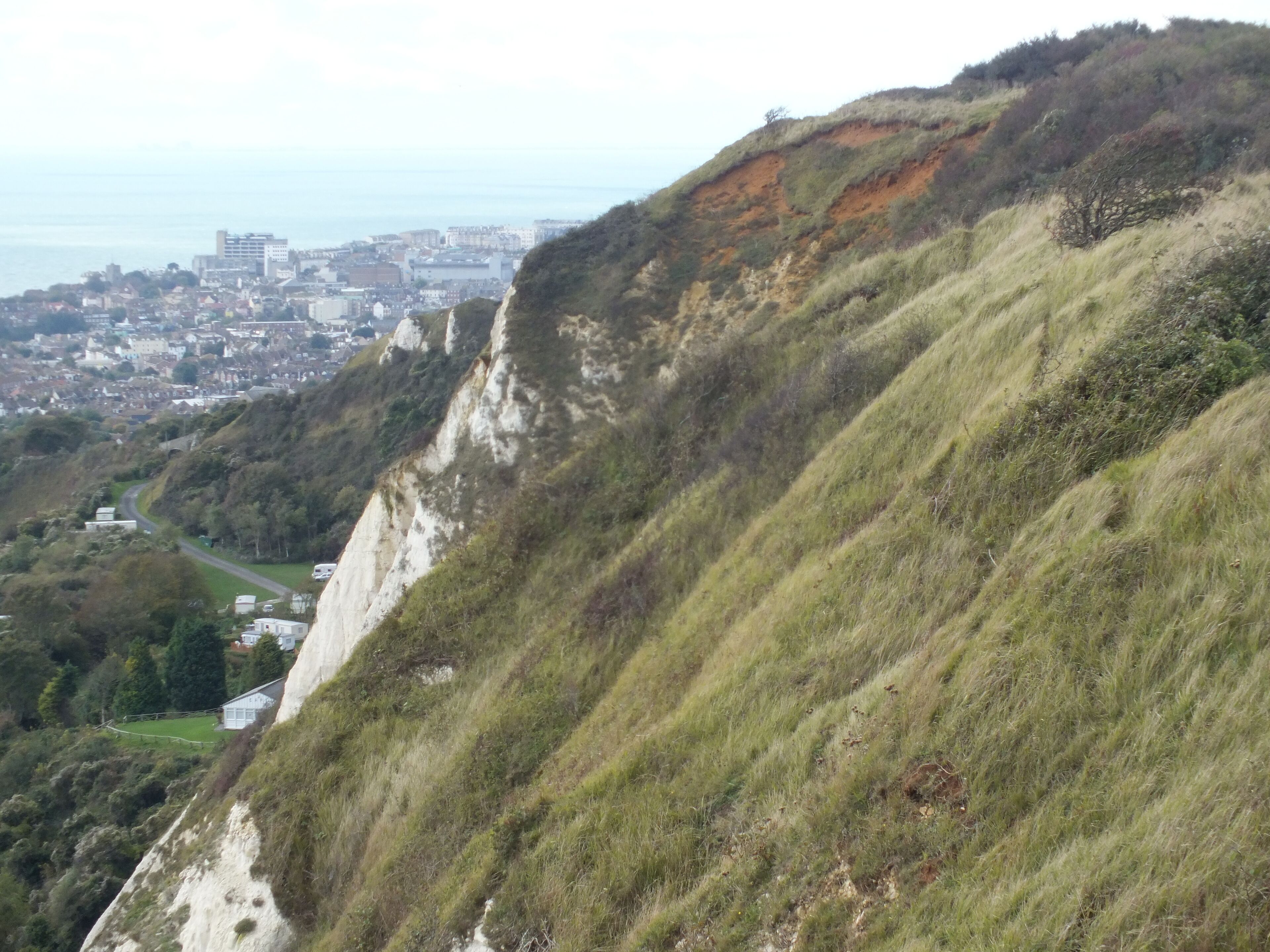 Battle of Britain Memorial, Capel-le-Ferne looks out over the English Channel with Folkestone Warren 100 m below. Down land grass clinging to the chalk.