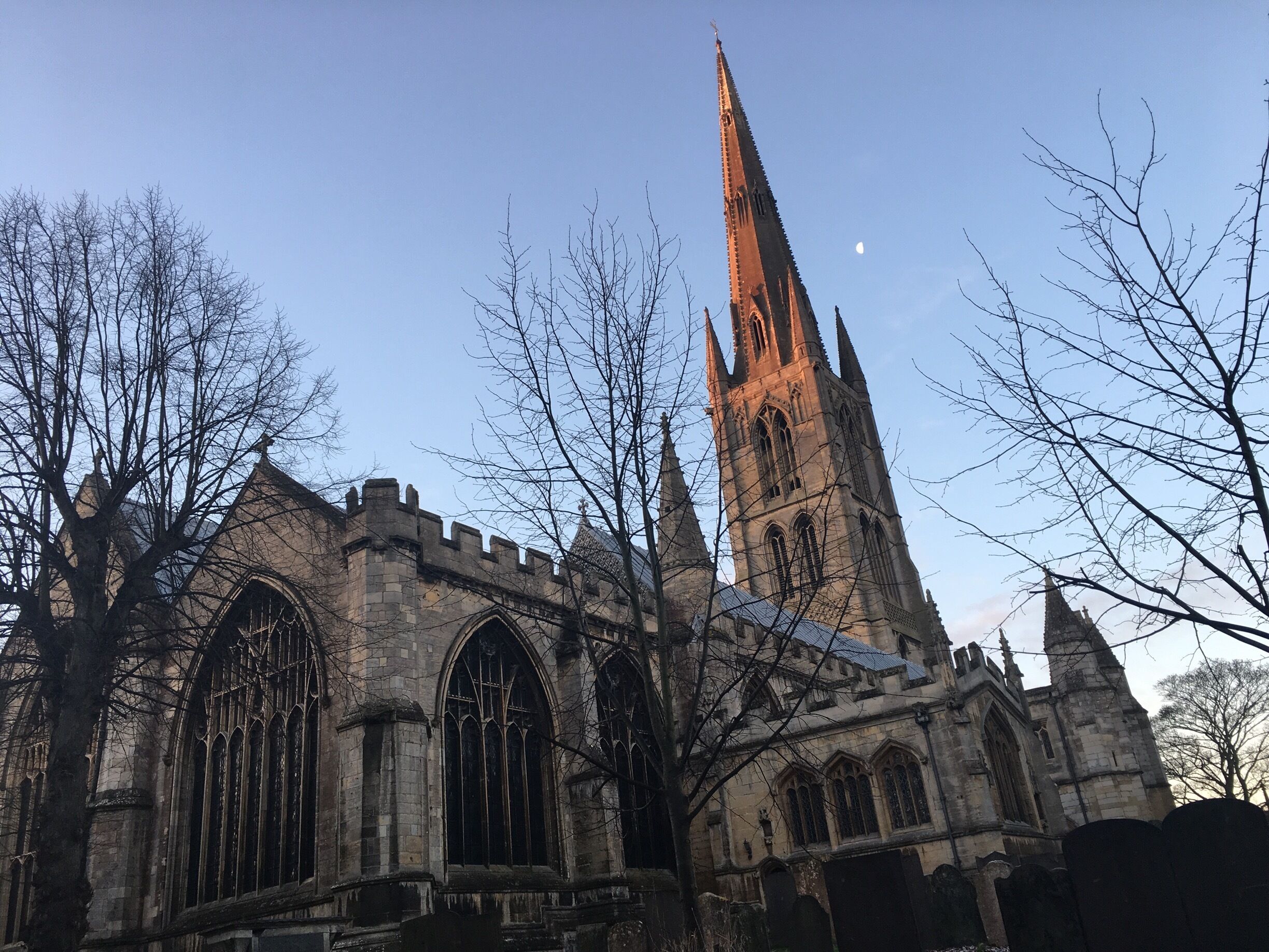 A historic church with tall spires and large arched windows.