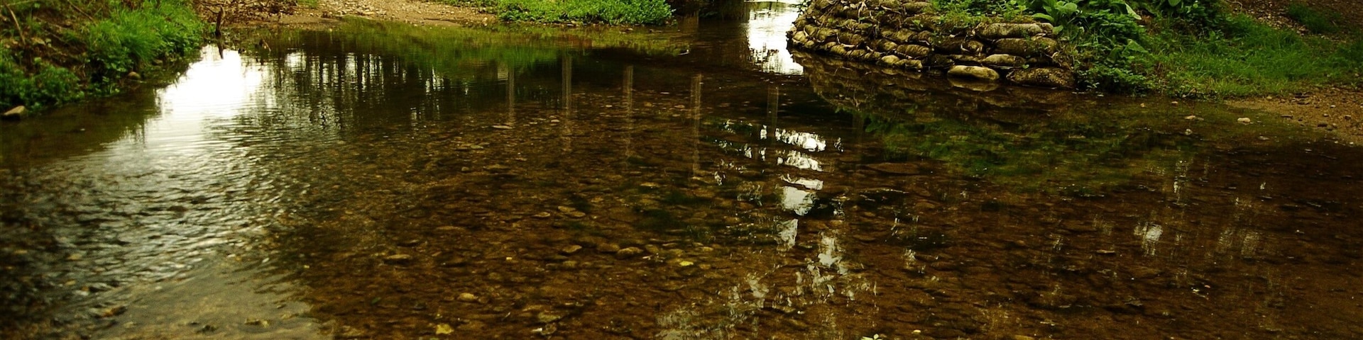 The "Bythams Brook", with a small footbridge, near Little Bytham in Lincolnshire.