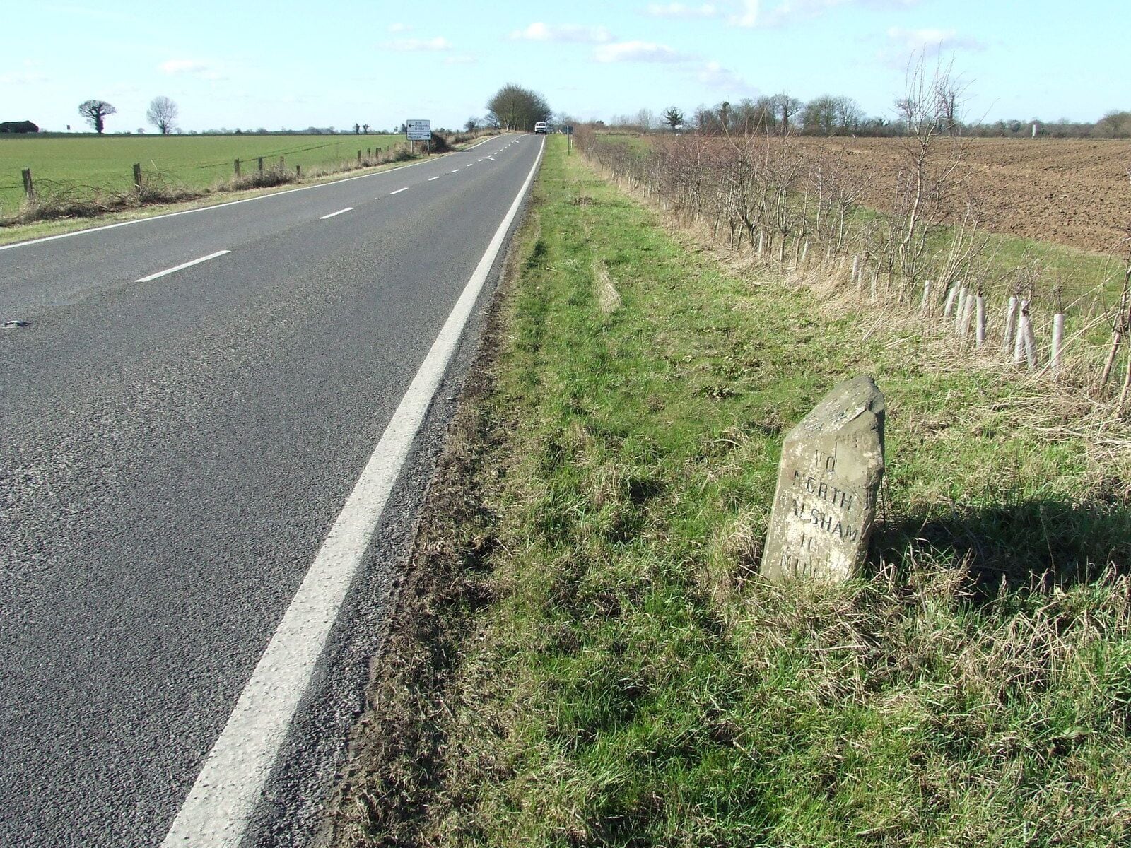 To North Walsham 16. Old milepost on the A.149 near to Rollesby, Norfolk. For close up view see 1732683 For more info on the post see http://www.milestonesweb.com/sites/tg438167.htm do have a look at their home page.