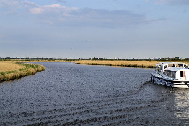 River Bure below Mautby Marsh Farm Looking down stream. Astree Farm draiange mill can be seen in the distance right of centre.