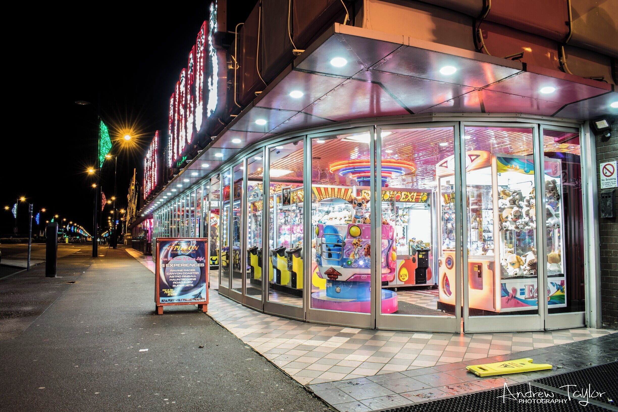 Great Yarmouth Seafront is a great place for an evening stroll , with all the bright colourful lights of the arcades . 