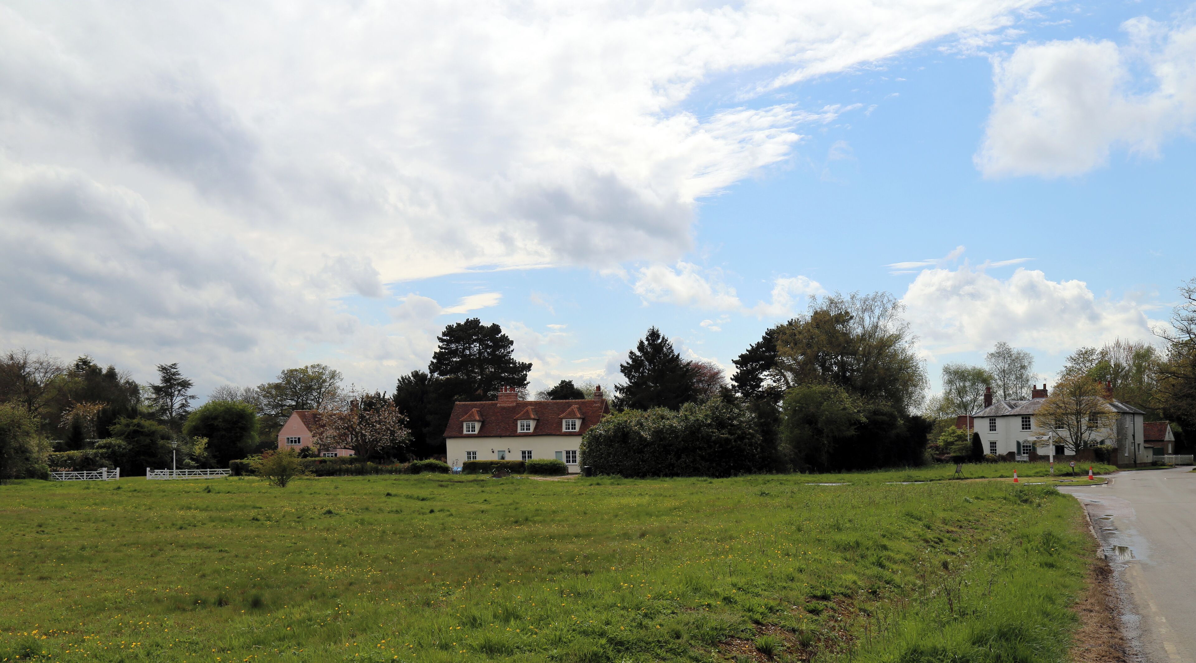 Across the village green from the east at Matching Green, Essex, England