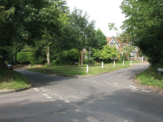 Triangular road junction, Roydon The junction between Epping Road (B181) which runs along the far side of the triangle, Low Hill Road (running back left to front right in this shot, and Park Fields (front left to back right)
