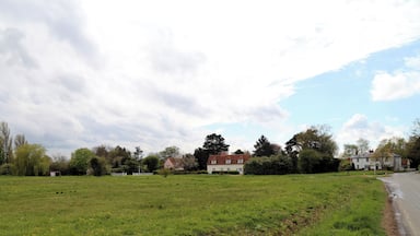 Across the village green from the east at Matching Green, Essex, England