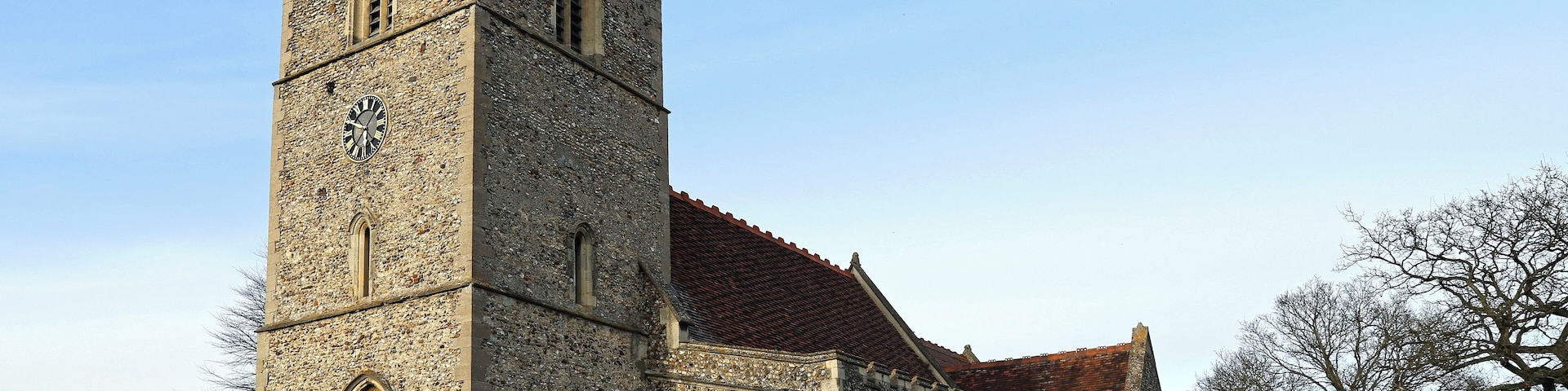 A view of the south-west of the Grade: II* listed early 13th-century St Mary the Virgin parish church of Matching, Essex, England. Software: file lens-corrected and optimized with DxO OpticsPro 10 Elite and Viewpoint 2, and further optimized with Adobe Photoshop CS2.