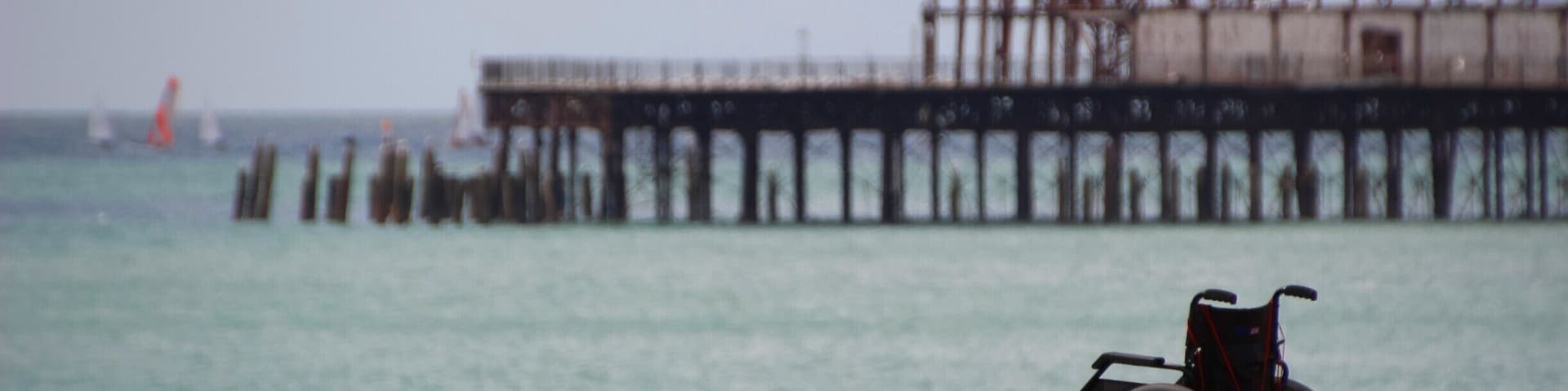 April 2014
A seemingly abandoned wheelchair sitting on Hastings beach in front of the burnt out remains of the town's pier.
#BeachBound