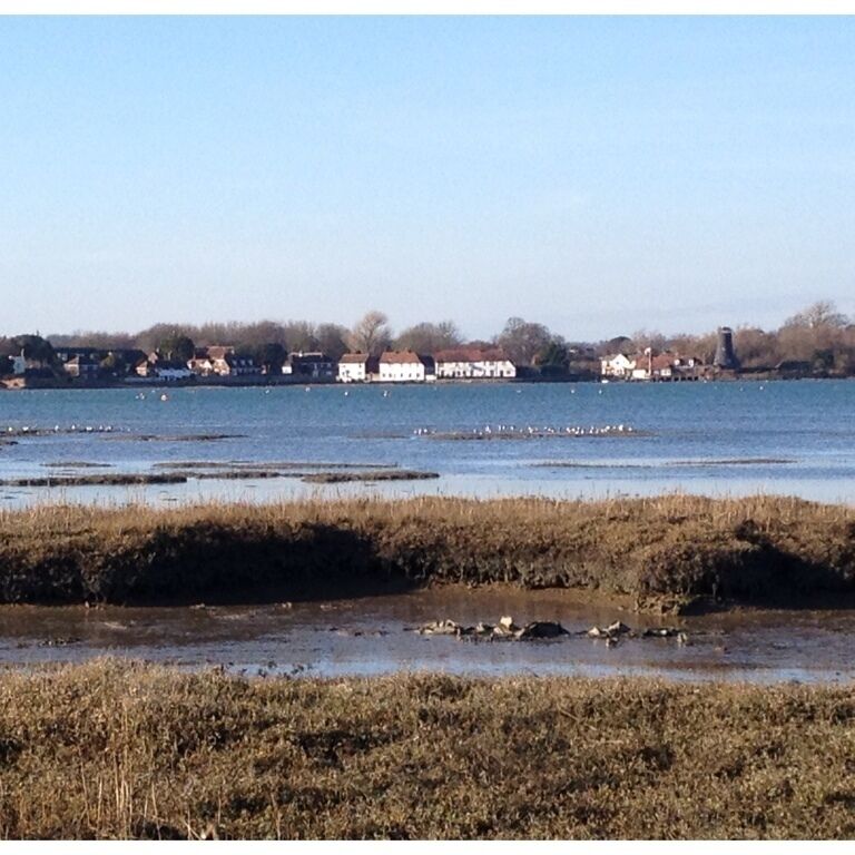 View across the water of The Ship Inn & The Mill from the Langstone Marina on a glorious February afternoon.