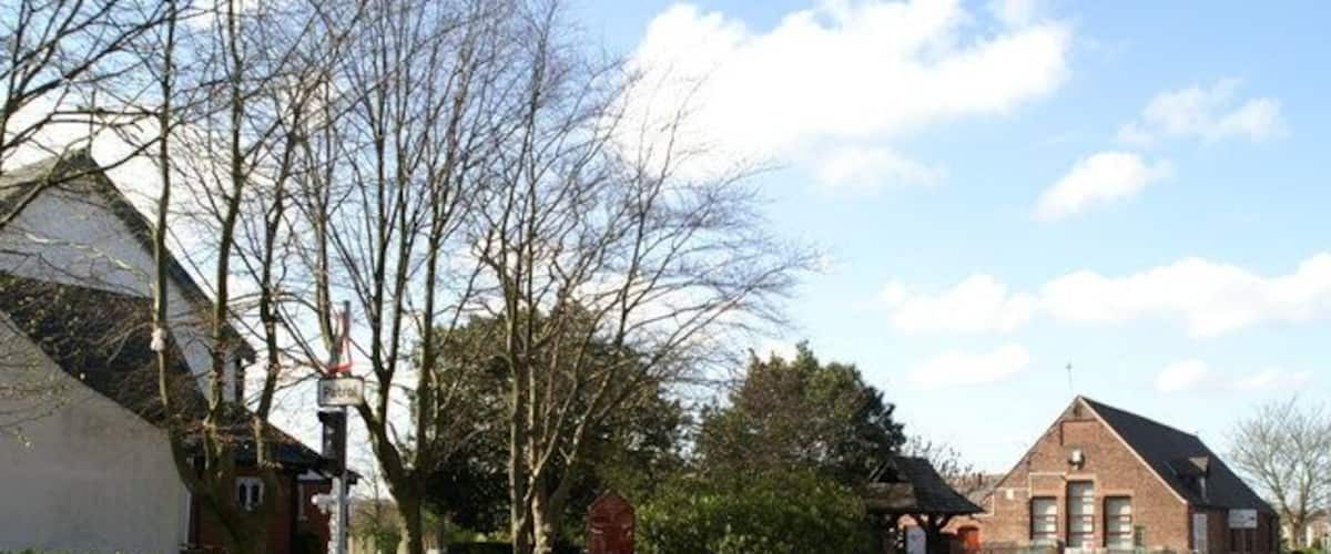 St James' Parish Centre (right) and part of the parish church (left), Church Road, Haydock, Merseyside, seen from the northeast