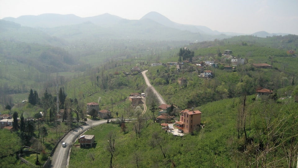 How long would you sit and admire the view? In the middle distance you can see almond and pistachio trees. Looking out from Boztepe. #pastorial