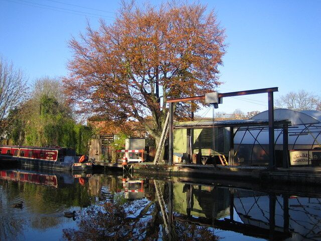Grand Union Canal: Winkwell Dock (3) This photograph shows the entrance to the dry dock about an hour before 614681. The cream superstructure of a narrowboat in the dry dock under the polytunnel covering can be seen far right of the photograph.