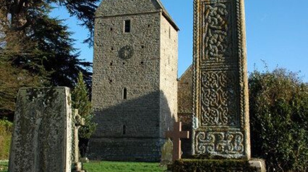 Celtic cross in St James' parish churchyard, Kinnersley, Herefordshire, with the west tower in the background