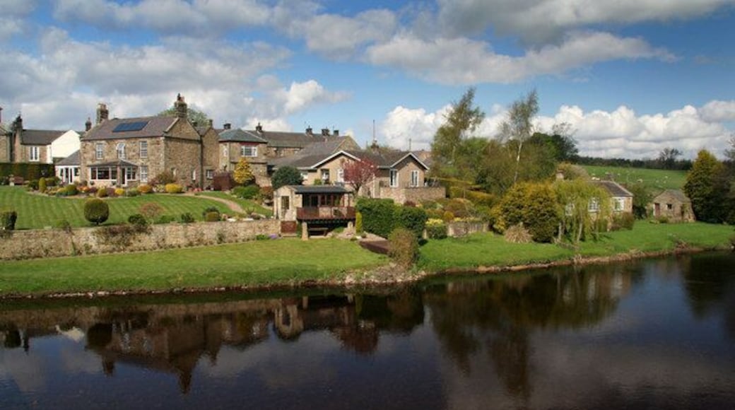Wark Houses on the side of the River North Tyne at Wark.