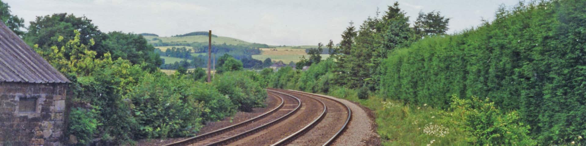 Site of Fourstones station, view west 1994. View westawrd, towards Carlisle: ex-NER Newcastle - Carlisle main line. The station was closed 2/1/67.