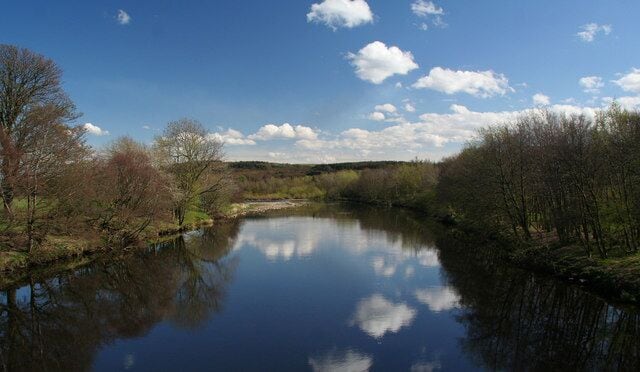 River South Tyne Looking down the South Tyne from the footbridge at Bardon Mill.