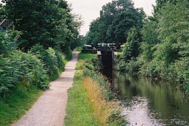 Spot Lock, No 20E, on the Huddersfield Narrow Canal just below Slaithwaite, West Yorkshire, looking west.