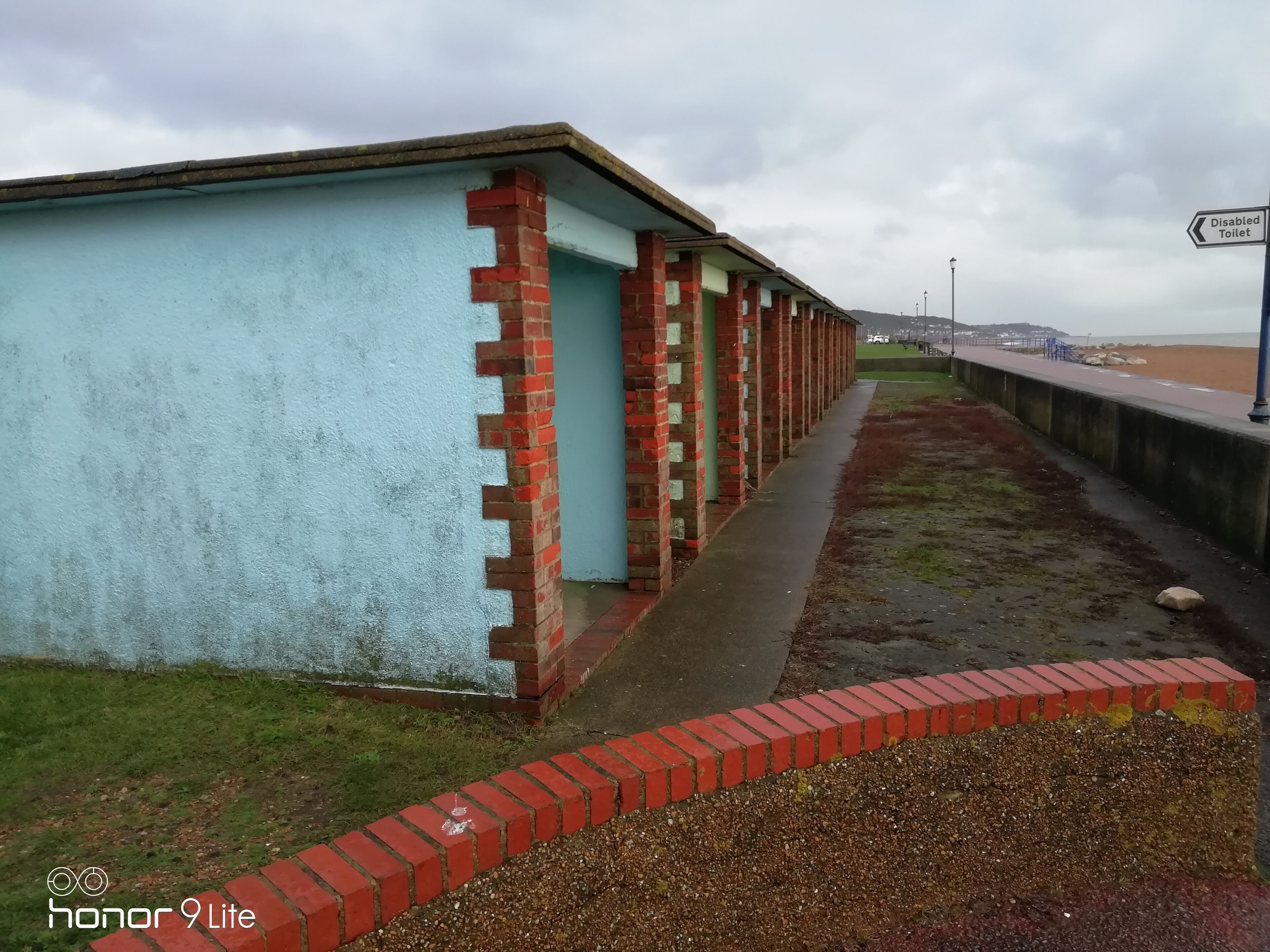 The beach huts on the seafront.