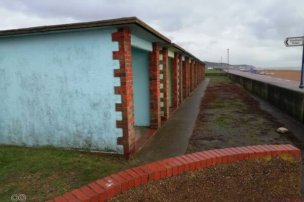 The beach huts on the seafront.